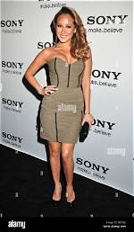 Unveiling Adrienne Bailon's Enduring Cultural Impact in the 2000S